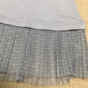 Beautiful light grey to with a flounce by LOGO.